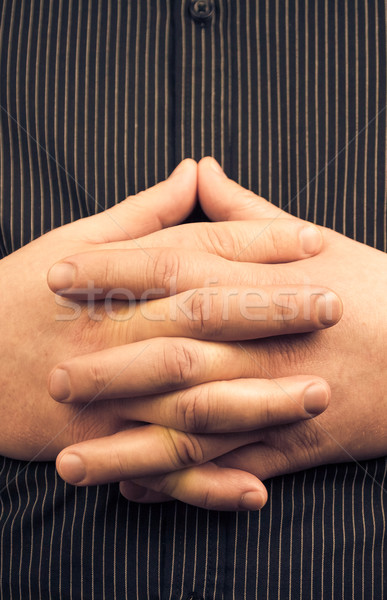 man wearing shirt folded hands Stock photo © fotoaloja