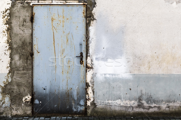 Ruined brick wall closed steel door Stock photo © fotoaloja