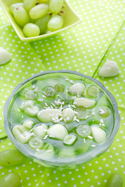 Delicious fruit jelly grapes dusted coconut shreds Stock photo © fotoaloja