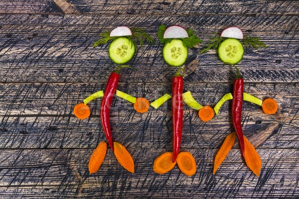 family people vegetable holding hands wooden carrots cucumber le Stock photo © fotoaloja
