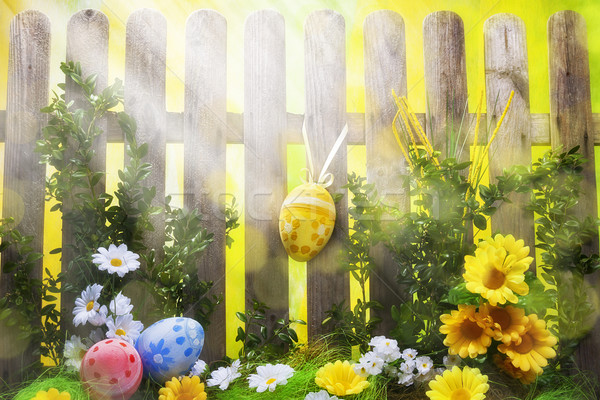 Art easter background with fence, eggs, spring flowers Stock photo © fotoaloja