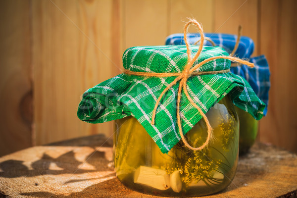 Pickled cucumbers jars wooden table Stock photo © fotoaloja