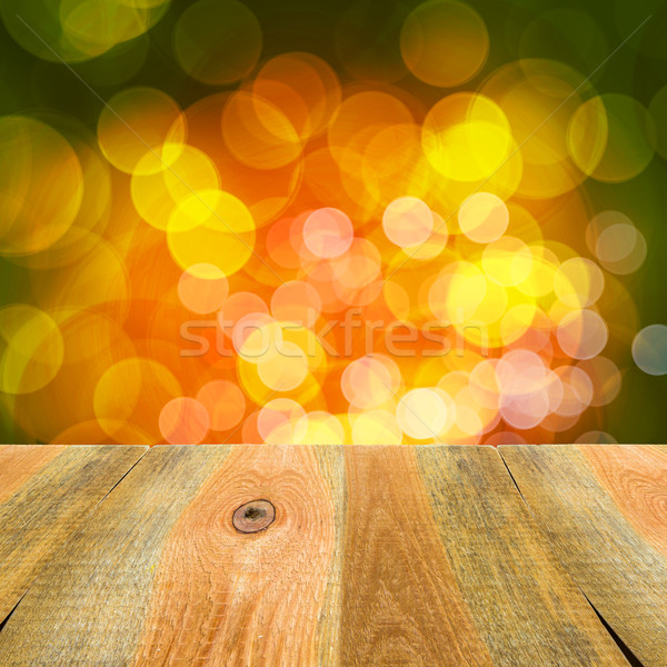 green orange yellow bokeh background wooden table Stock photo © fotoaloja