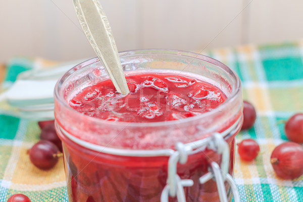 Gooseberry jam spoon jar Stock photo © fotoaloja