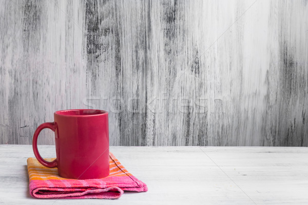 Still life red mug kitchen cloth Stock photo © fotoaloja