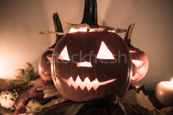 Halloween pumpkin lanterns dark light angry face fall Stock photo © fotoaloja