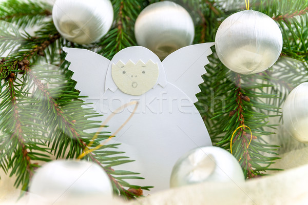 Christmas card with paper angel, balls and spruce twig Stock photo © fotoaloja