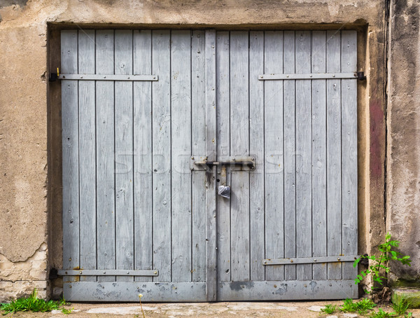 Ruined brick wall closed steel door Stock photo © fotoaloja