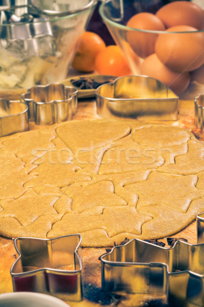 Christmas glazed biscuit shapes imprinted dough Kitchen table wi Stock photo © fotoaloja