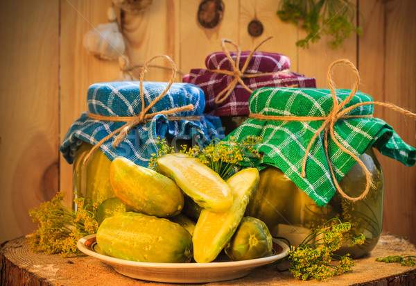 Jars pickled gherkins wooden table Stock photo © fotoaloja