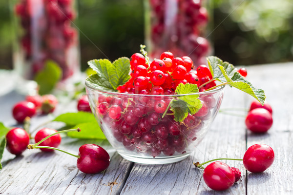 Fruits cherries currants wooden background Stock photo © fotoaloja