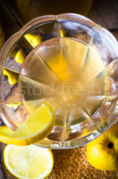 alcohol quince liqueur sliced fruit jar wooden cups Stock photo © fotoaloja
