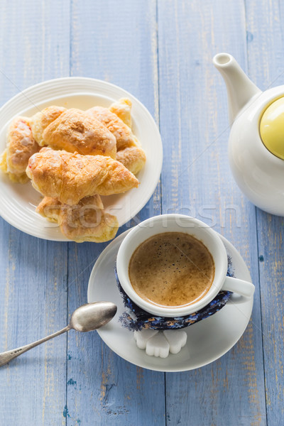 Stock photo: coffee cup black wooden board brown white jug milk croissants