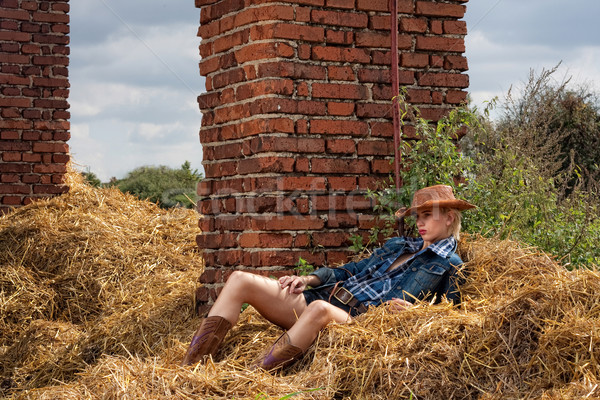 Atractivo vaquero nina pueblo mujer pared Foto stock © fotoduki