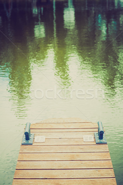 Wooden wharf and blue water Stock photo © fotoduki