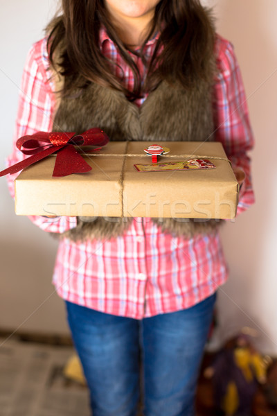 Girl presenting a gift Stock photo © fotoedu