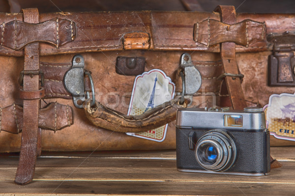 Stock photo: Vintage photo camera and suitcase