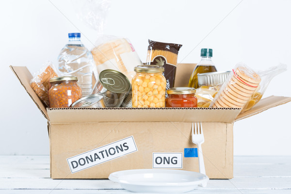 Voedselveiligheid huisvesting voedsel schenking arme Stockfoto © fotoedu