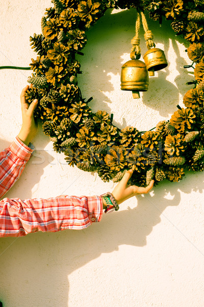 Girl placing Christmas ornaments Stock photo © fotoedu