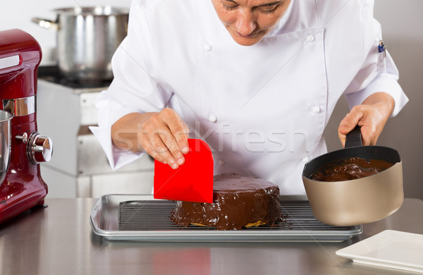 Pastry chef in the kitchen Stock photo © fotoedu