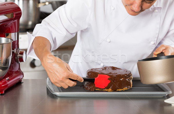 Pastry chef in the kitchen Stock photo © fotoedu