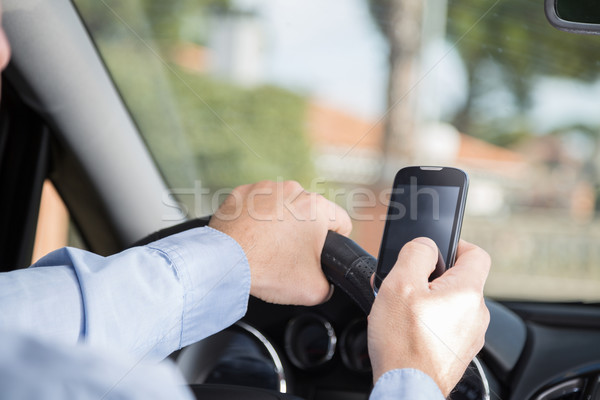 Man with mobile and driving Stock photo © fotoedu