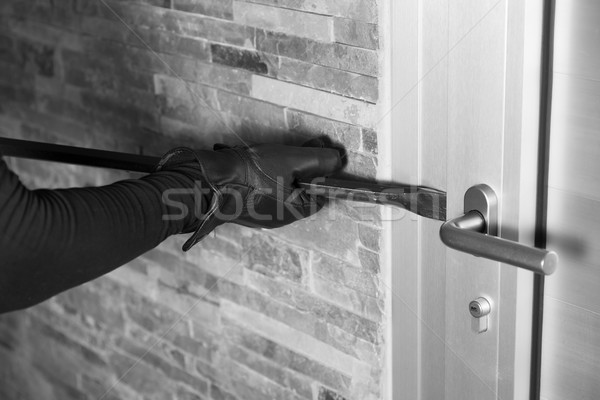 Thief with a bar of iron Stock photo © fotoedu