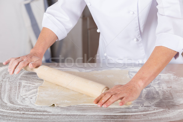Baker kneading dough Stock photo © fotoedu