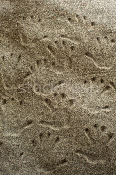 Handprints In The Sand Stock photo © Fotografiche