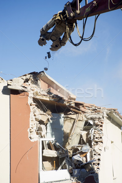 Stock photo: The controlled demolition of a house