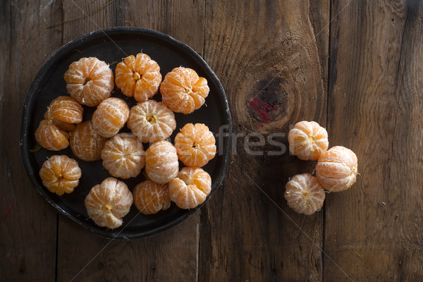 Small peeled mandarin Stock photo © Fotografiche