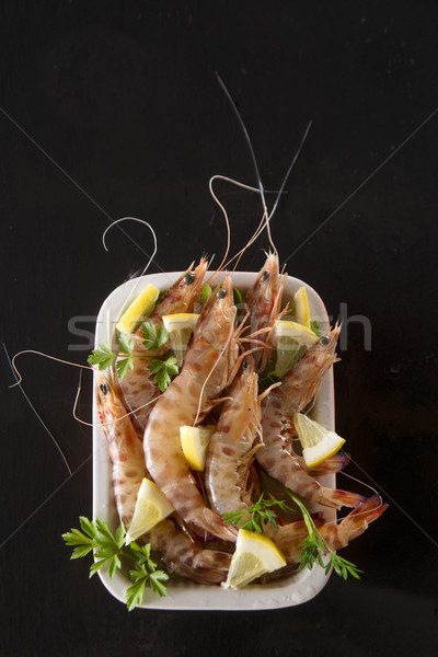 Crustaceans on black background Stock photo © Fotografiche