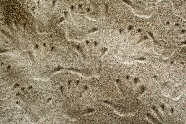 Handprints In The Sand Stock photo © Fotografiche