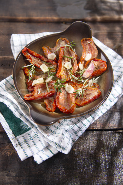 Dried tomatoes and rosemary Stock photo © Fotografiche