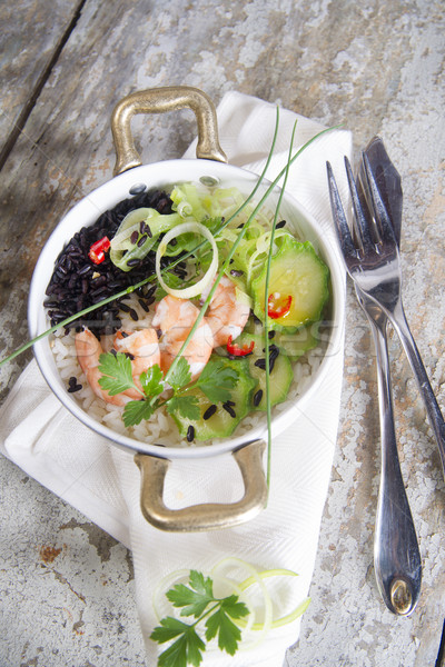 Black and white risotto with shrimp and zucchini Stock photo © Fotografiche