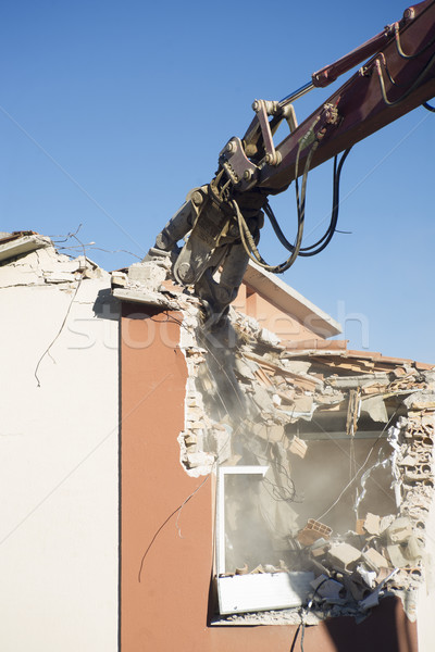 Stock photo: The controlled demolition of a house