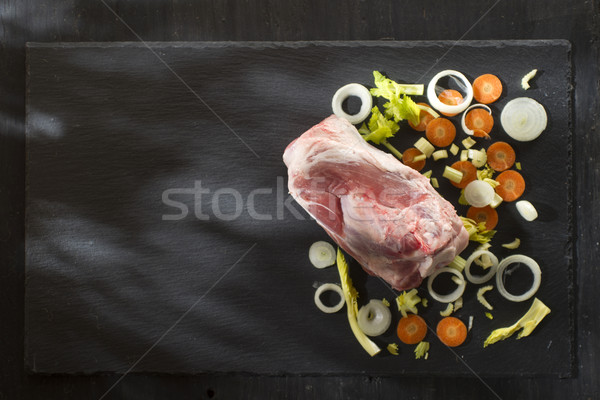 Sípcsont nyers disznóhús bemutató kő étel Stock fotó © Fotografiche