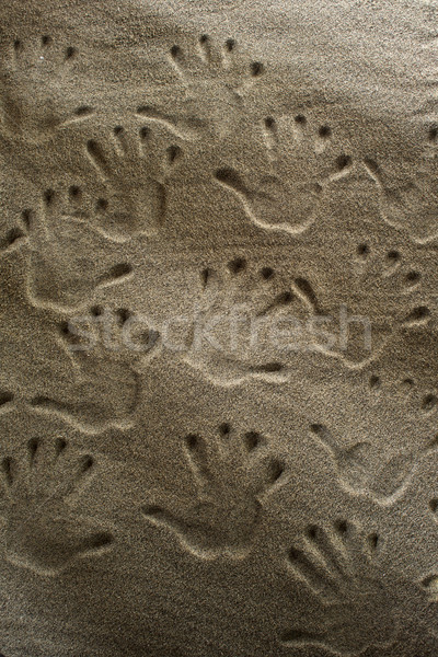 Handprints In The Sand Stock photo © Fotografiche