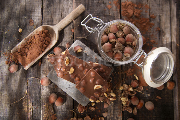 Chocolade hazelnoten stukken melk houten tafel donkere Stockfoto © Fotografiche