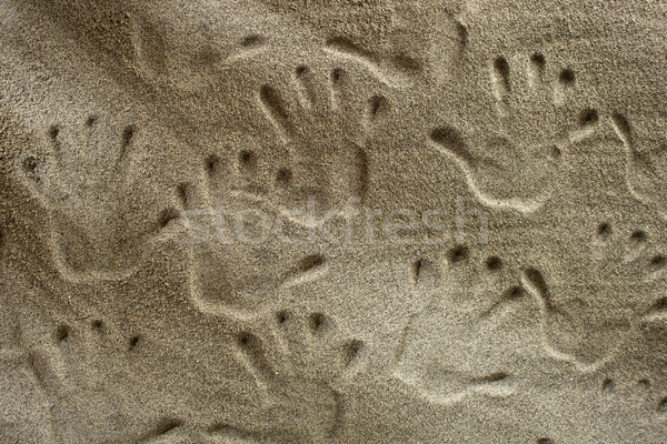 Handprints In The Sand Stock photo © Fotografiche