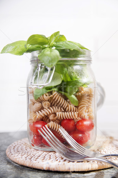 Makaronu sos pomidorowy bazylia szkła jar składniki Zdjęcia stock © Fotografiche