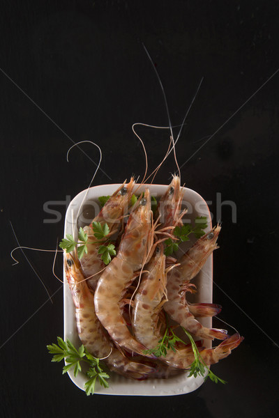 Crustaceans on black background Stock photo © Fotografiche