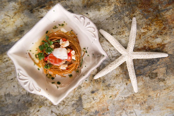 Spaghetti with scallops Stock photo © Fotografiche