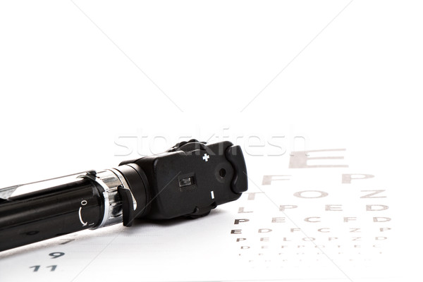 Ophthalmoscope is on a vision test Stock photo © fotoquique