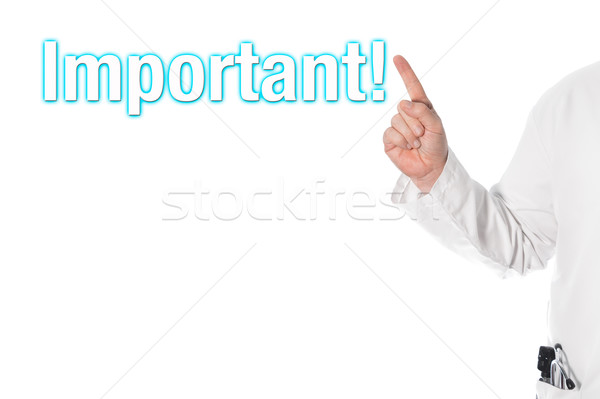 Lekarza wskazując tytuł ważny palec nagłówek Zdjęcia stock © fotoquique