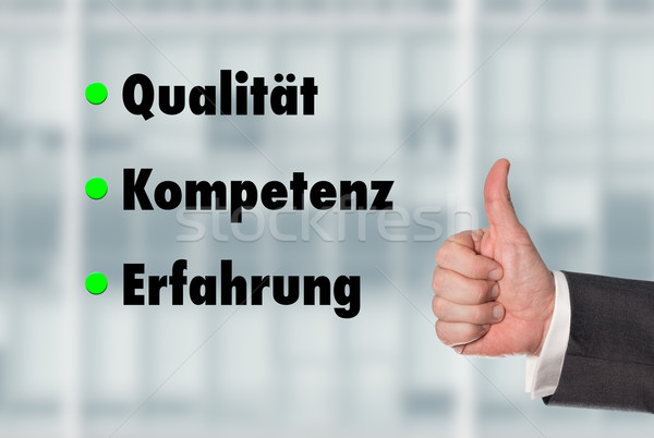 Business man holding a thumb up, Quality-Competence-Experience Stock photo © fotoquique