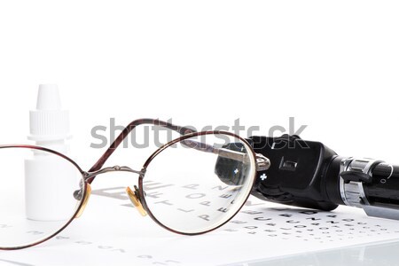 Látásvizsgálat szemüveg üveg szem cseppek előrelátás Stock fotó © fotoquique
