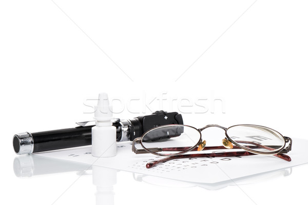 Ophthalmoscope, eye test and glasses Stock photo © fotoquique