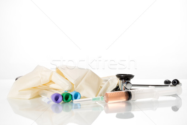 Stethoscope with latex gloves Stock photo © fotoquique