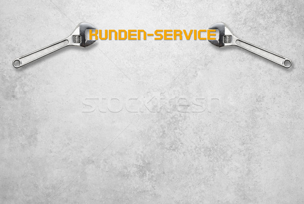 Wrench holds lettering, customer service Stock photo © fotoquique